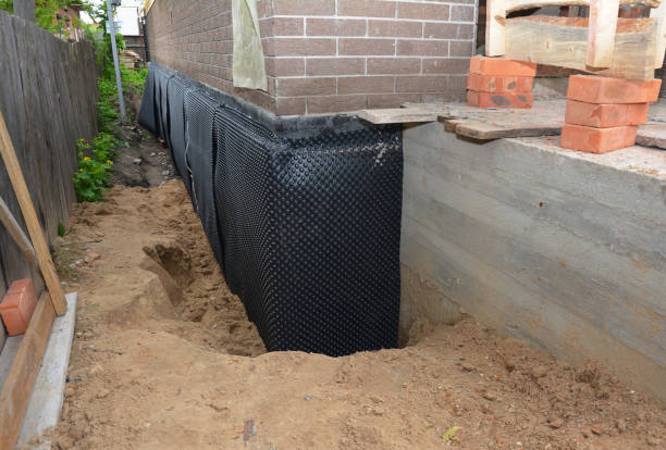 Happy homeowners after waterproofing job in Hainesport